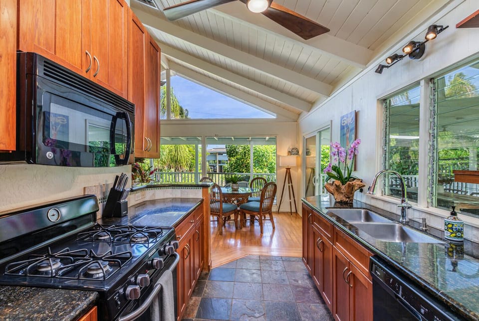 Kitchen opens to dining area