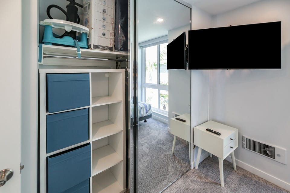 Flatscreen tv and plenty of closet space with baby booster seat and pack 'n play