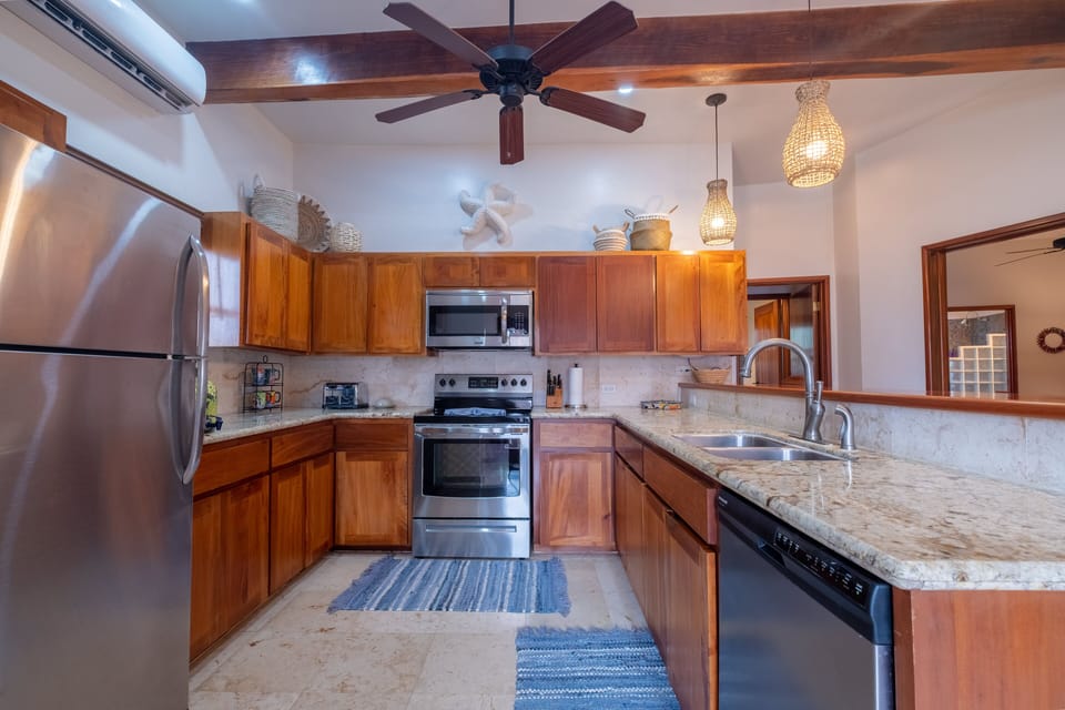 Fully equipped kitchen with new design and light fixtures