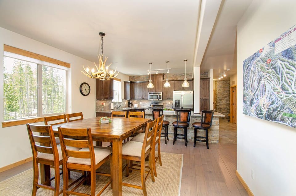 Seating for eight around the dining table plus three seats at the breakfast bar