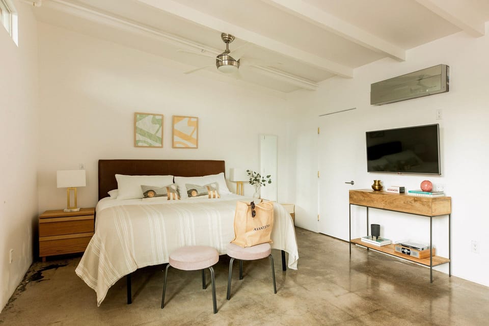 Bedroom with a TV.
