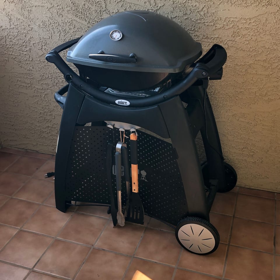 Electric BBQ and tools on downstairs deck
