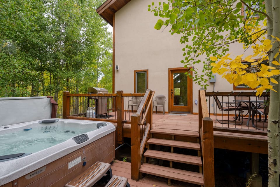 Deck leads out to the private hot tub
