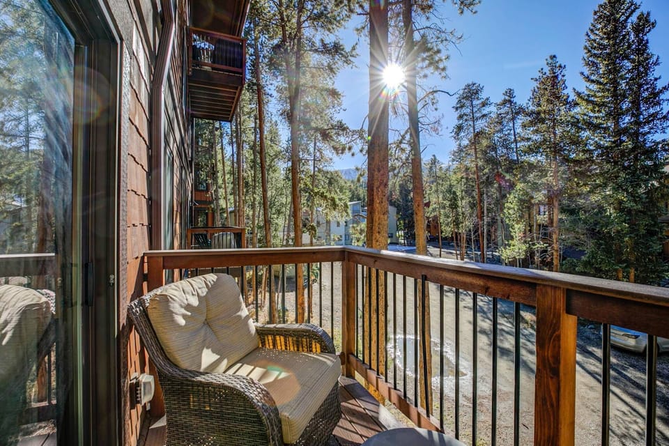 A step-out balcony with two chairs offers a lovely spot to take in the fresh mountain air.