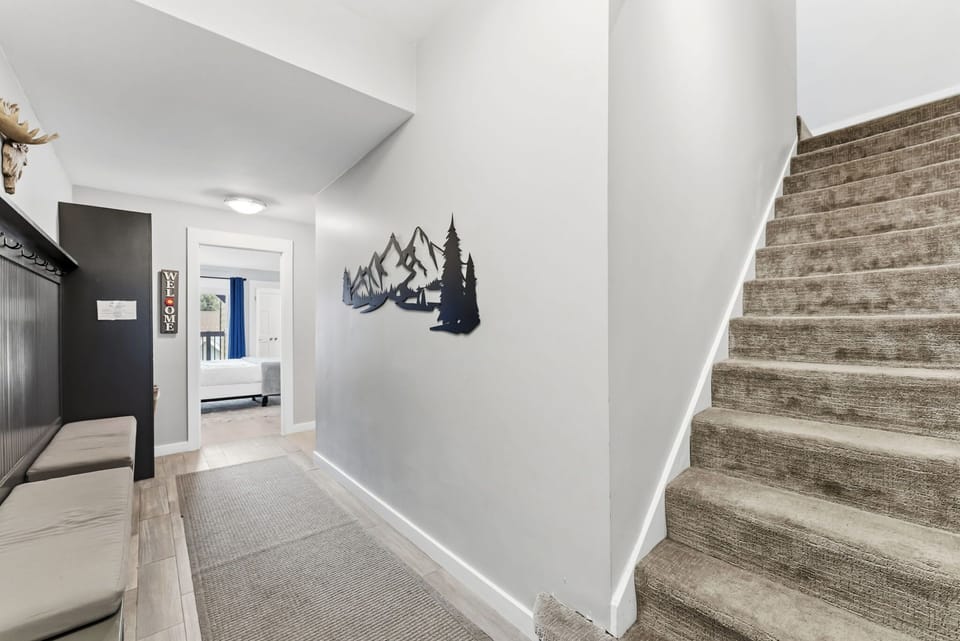 The view up the stairs leading to the loft of the condo.
