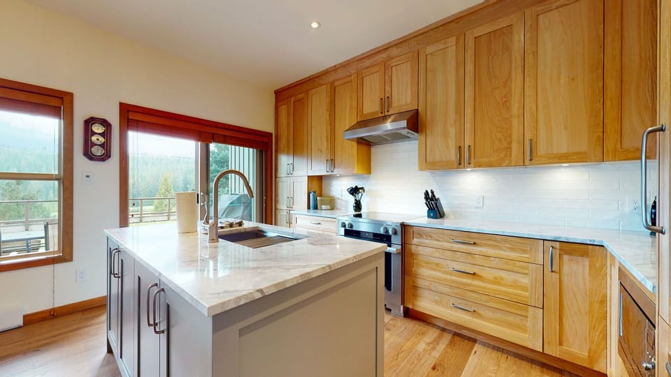 The fully equipped kitchen makes cooking a breeze after a day on the slopes.