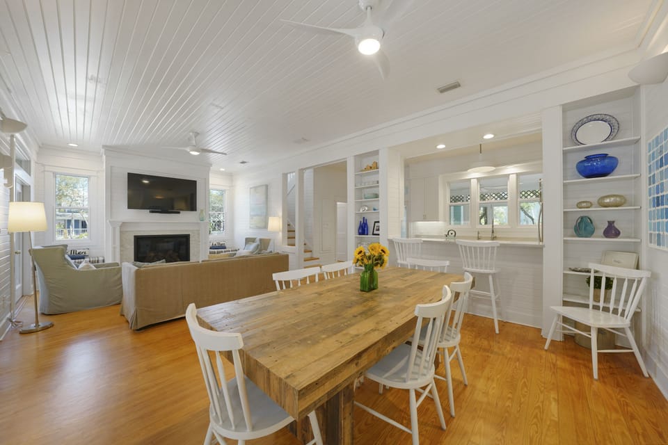 DINING SPACE ON FIRST LEVEL WITH TABLE SEATING 6