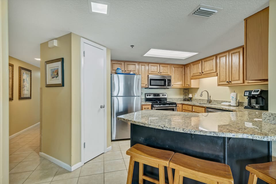 Updated, Fully Equipped Kitchen with Stainless Appliances and Granite Counter Tops