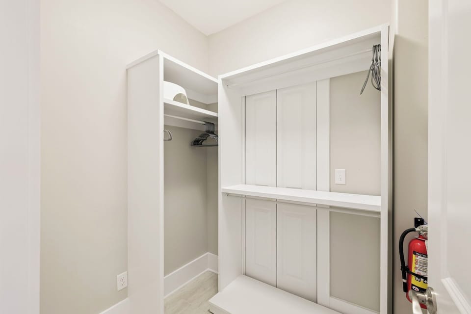 Your spacious walk-in closet offers abundant storage with custom shelving and hanging space for all your vacation wardrobe essentials.