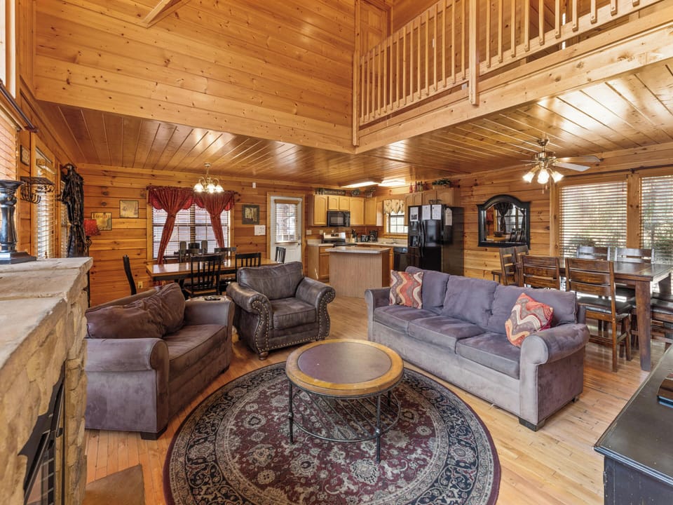 Living Room - Fireplace + Deck Access