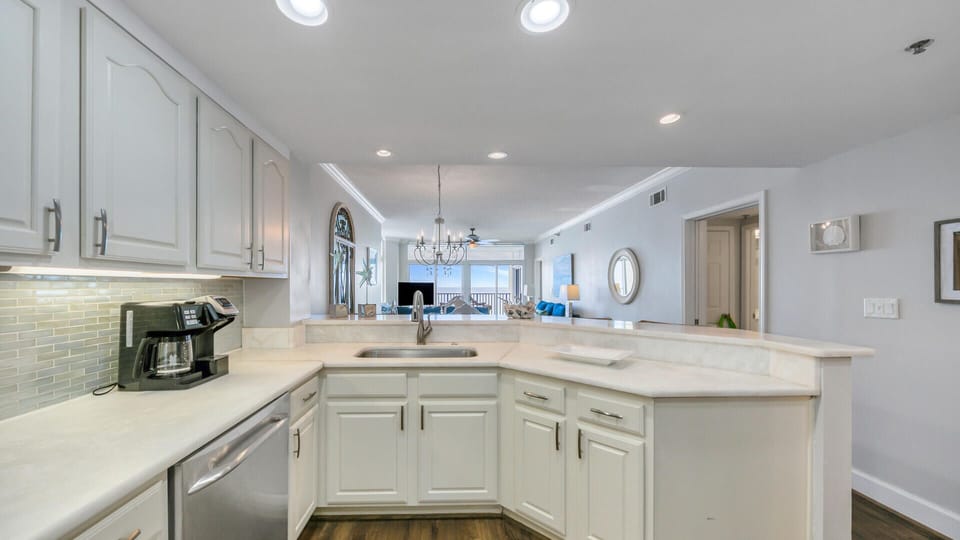 This open floor plan allows for cooking in the kitchen while interacting with others. It's great for entertaining guests or just spending time with family.