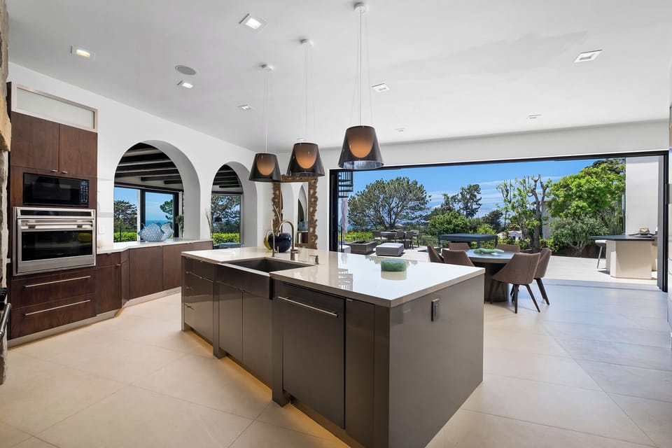 Open floor plan, enter the backyard off of the kitchen