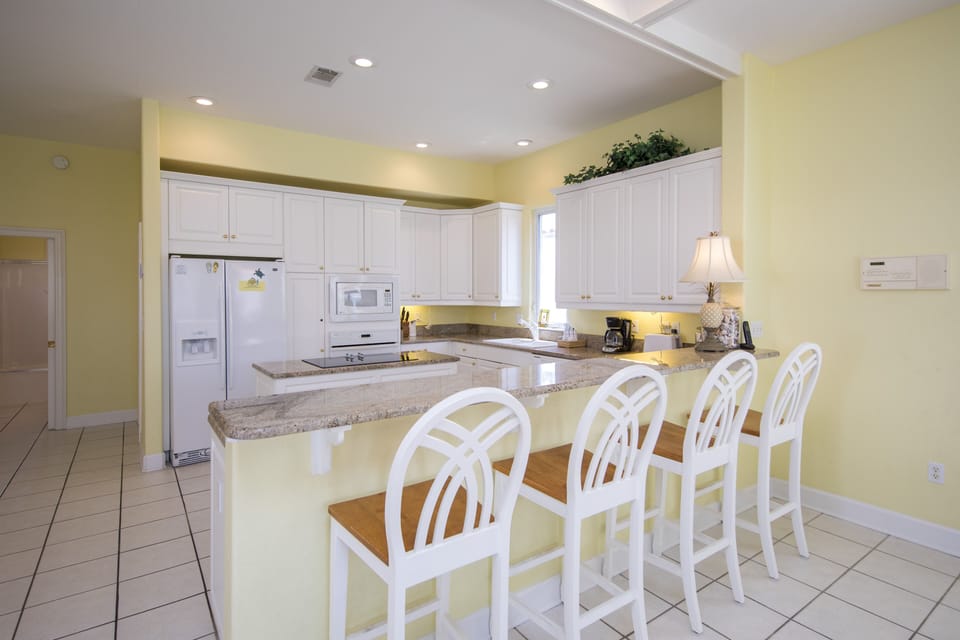 Kitchen with bar top seating