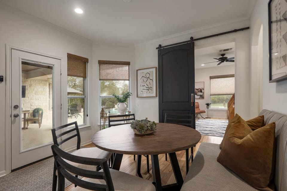 View outside from dining/kitchen and view into Bedroom 5