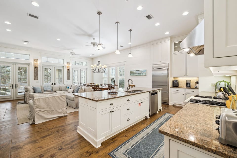 Your spacious open-concept kitchen flows seamlessly into the living area, where you'll love cooking and relaxing together.
