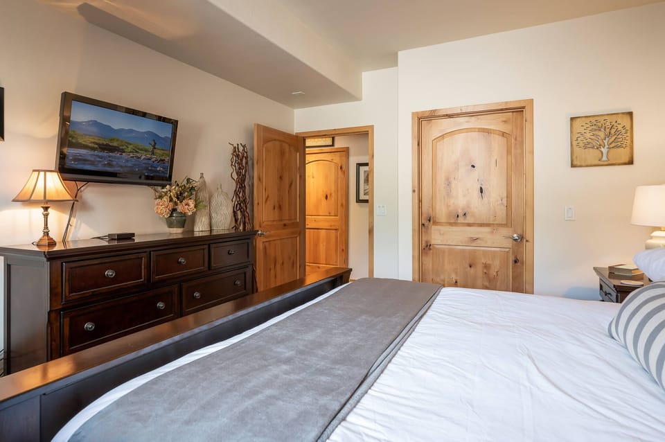 Flat screen TV in the Primary King bedroom
