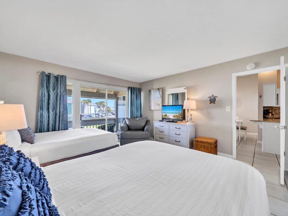 Balcony Access and TV In Bedroom