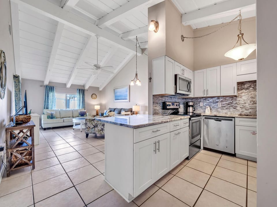 Enter The Condo to The Kitchen and Living Room