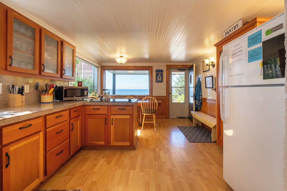 Large kitchen area and dining - Fully stocked with everything you need for creating a masterpiece.