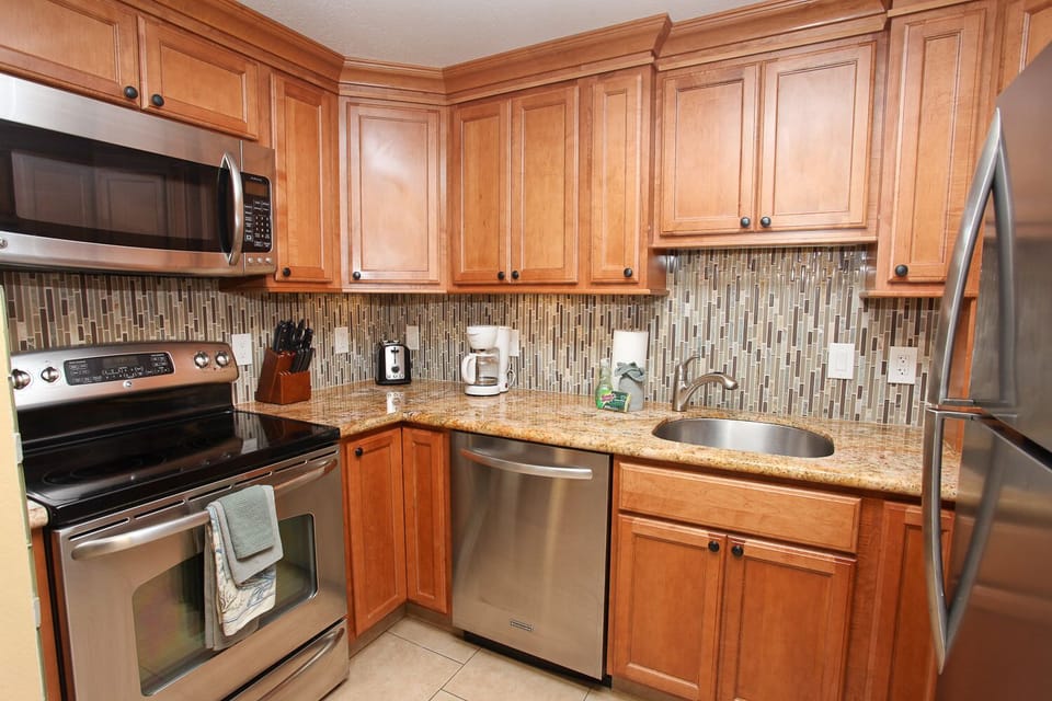Granite counters and stainless steel appliances.