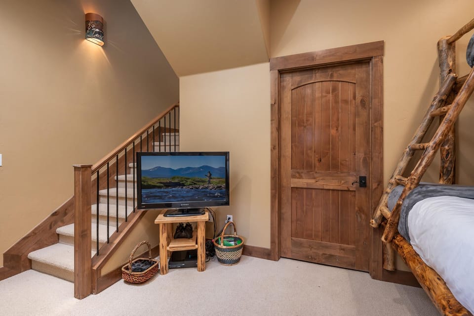 Flat screen TV in the lower level sleeping nook/living room
