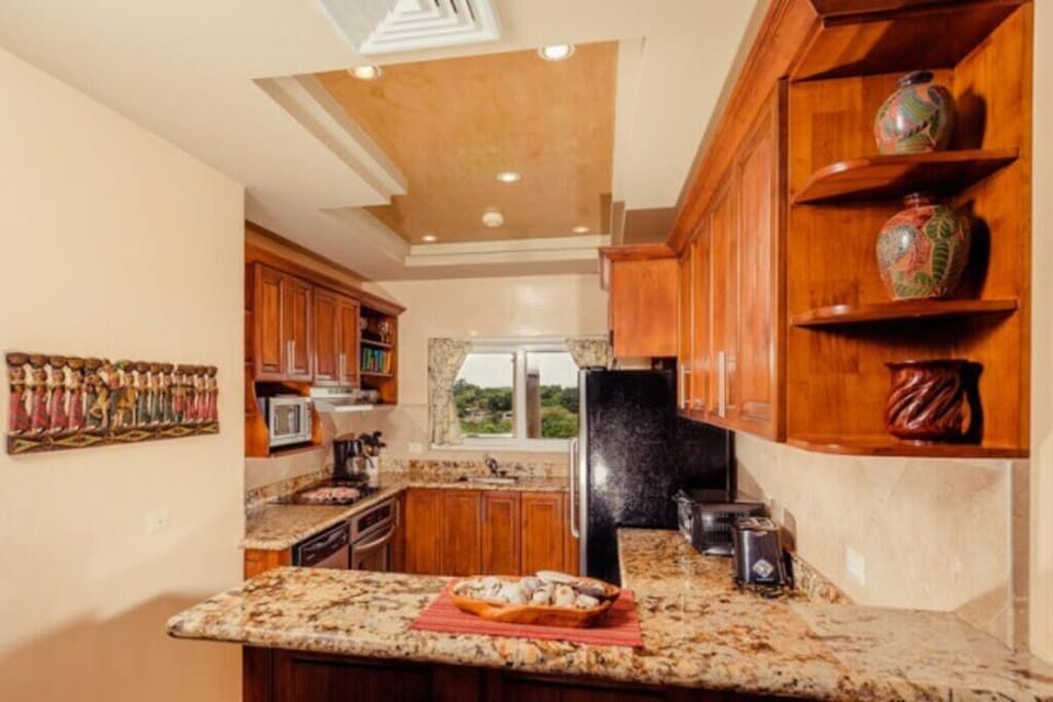 This kitchen is fully equipped, ready for your cooking dreams.