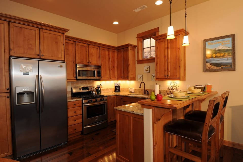 The living room is open to the dining area and kitchen.