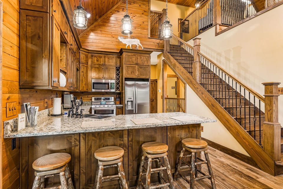 Main Level - Fully Equipped Kitchen w/ Breakfast Bar Seating