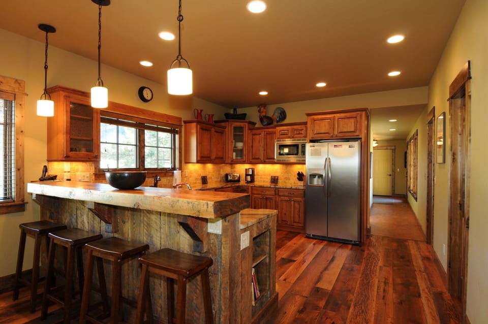 Great kitchen with additional seating at the bar.
