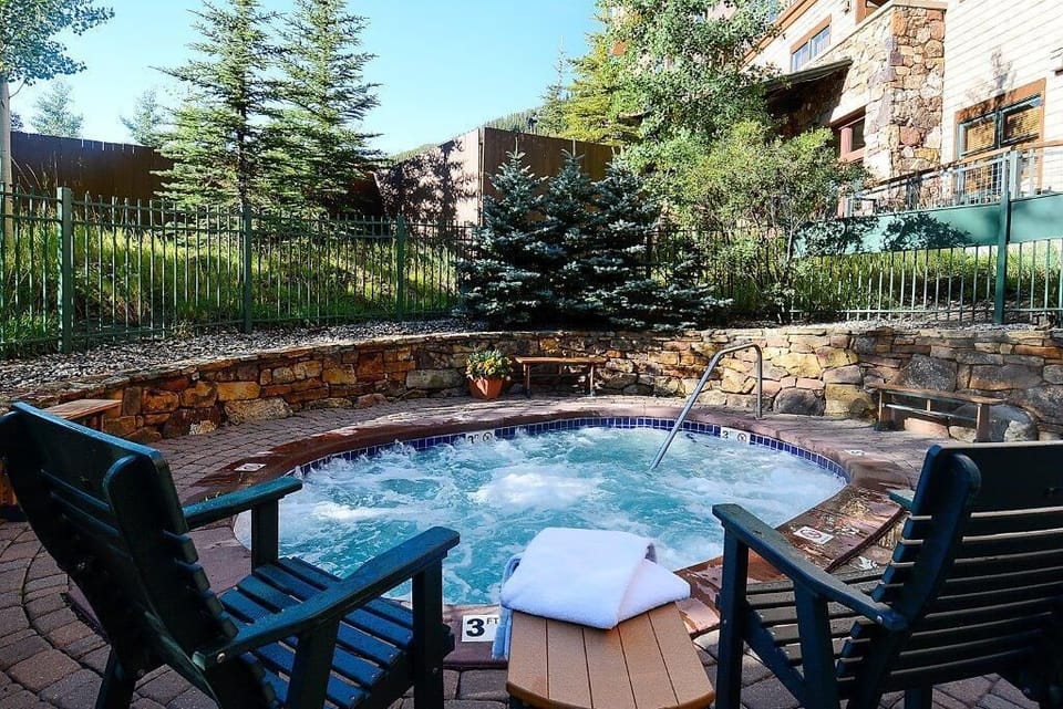 Relax after a long day in two shared outdoor hot tubs