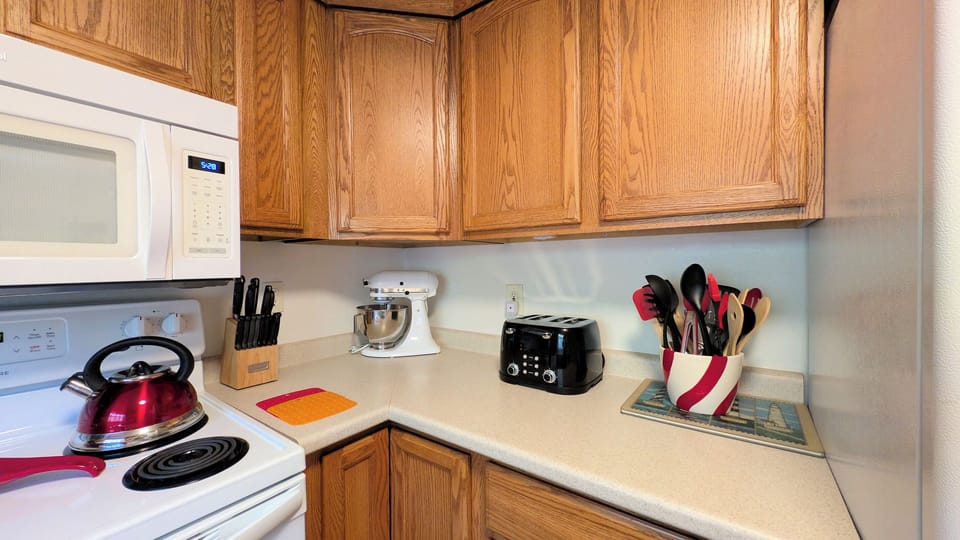 kitchen with electric range & stand mixer