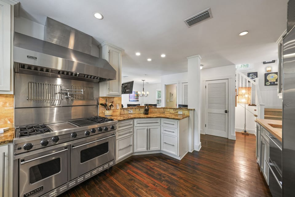 GRAND KITCHEN AND OPEN FLOOR PLAN ON FIRST LEVEL