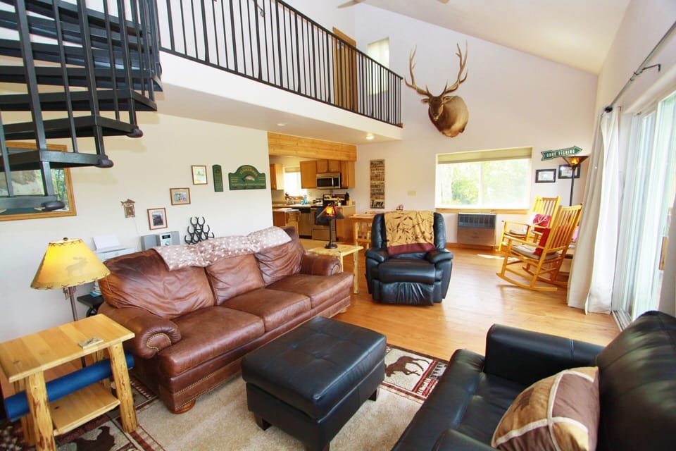 Spiral staircase leads to second story where there are two bedrooms