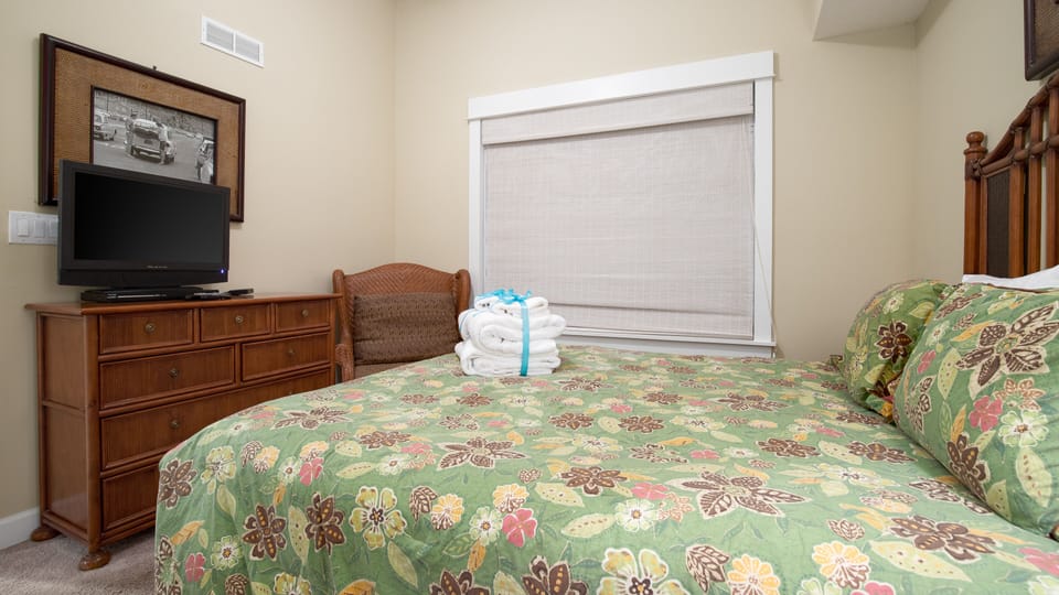 Guest Bedroom - The guest bedroom has a flat screen TV for your entertainment.