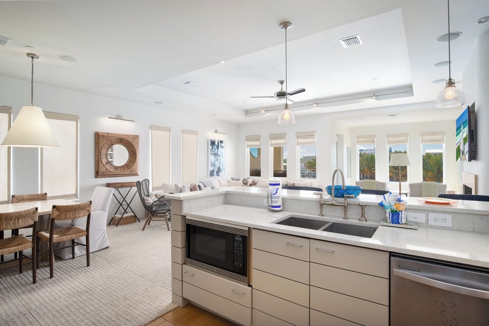 GENEROUS COMBINED LIVING AND DINING WITH HIGH CEILINGS