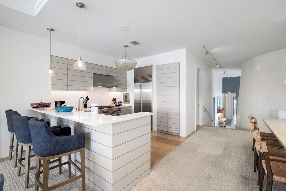 OPEN LAYOUT WITH FULLY EQUIPPED, SPACIOUS KITCHEN