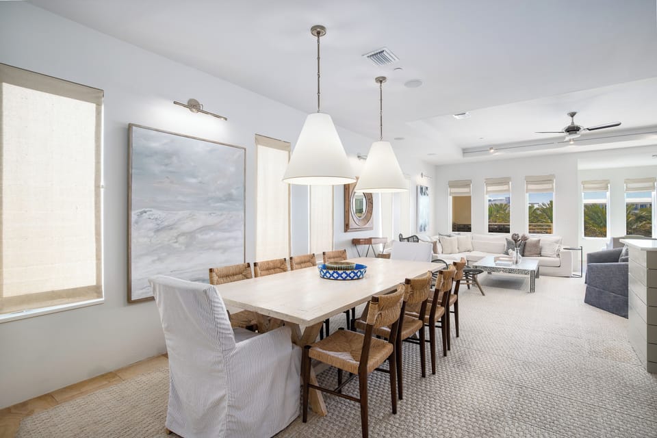 DINING AREA FACING LIVING WITH PANORAMIC VIEWS OF TOWN AND GULF