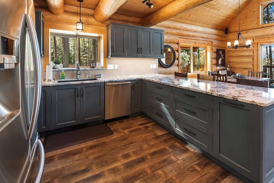Tall Pines: - Granite counters and plenty kitchen prep space.