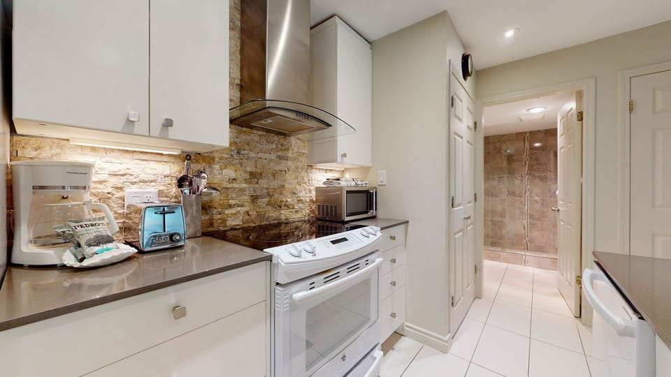 From coffee to dinner, this kitchen has everything you need for a seamless stay.
