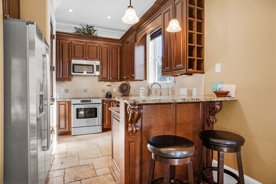 Kitchen with eat-in bar seating