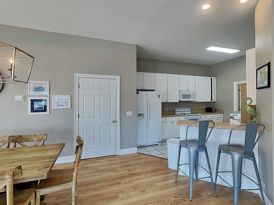 Dining Area and Kitchen with Breakfast Bar - First Floor