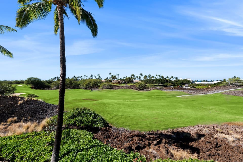 Gorgeous golf course views from the primary bedroom lanai