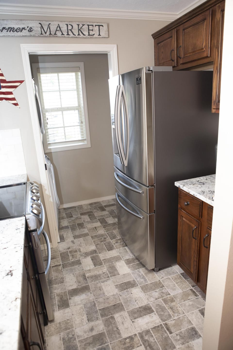 New refrigerator with freezer in the bottom and wine chiller.