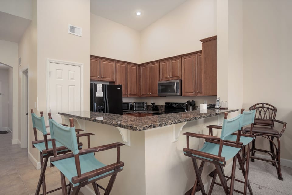 Open Kitchen allows for everyone to stay connected during meal prep.