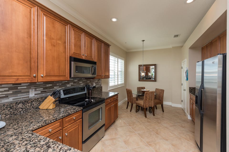 Breakfast nook by the kitchen widow makes for a delightful mealtime.
