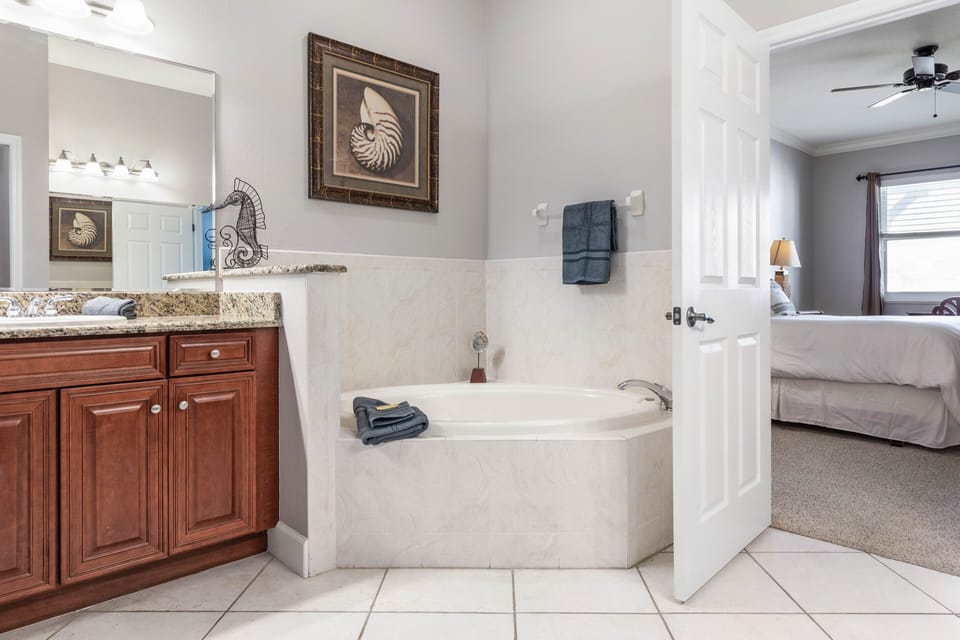 Master Bathroom with shower and separate soaking tub.