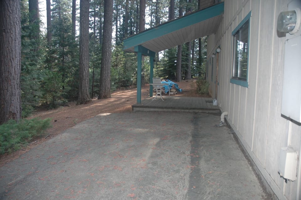The side porch is a great place to enjoy your morning coffee and the peace and quiet.