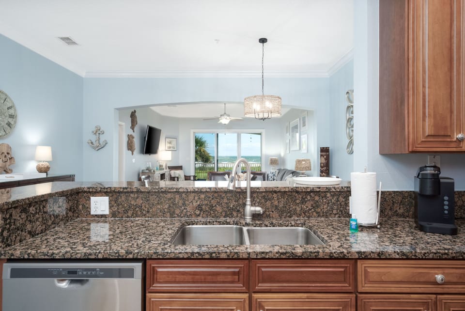 See the ocean from the kitchen, dining and living room.