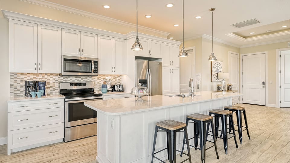 Sleek, modern appliances meet thoughtful design—cooking here feels like a breeze.