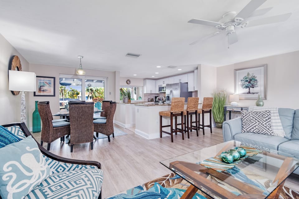 Share family meals around the dining table, just steps from the kitchen and overlooking the lanai.